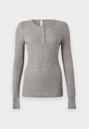 Gray long-sleeve henley shirt made of ribbed fabric, featuring a rounded neckline and three button placket. Tight fit with seamless cuffs.