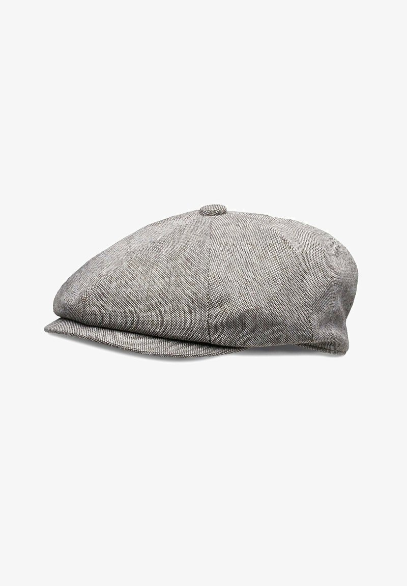 Grey herringbone-patterned flat cap, made from textured fabric with a rounded crown and curved brim, featuring a central top button.