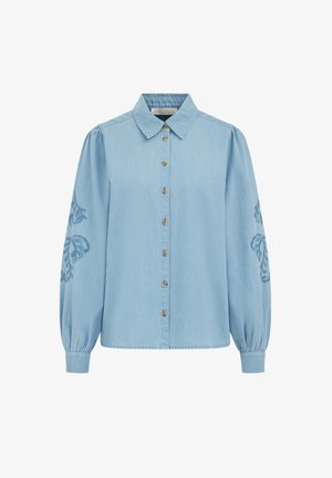 Hele sinine pika varrukaga pluus ees olevate nööpidega, terava kraega, volditud mansettidega ja õlgadel peenelt tikitud lillemotiividega.