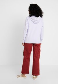 Nike Sportswear Luvtröja - purple