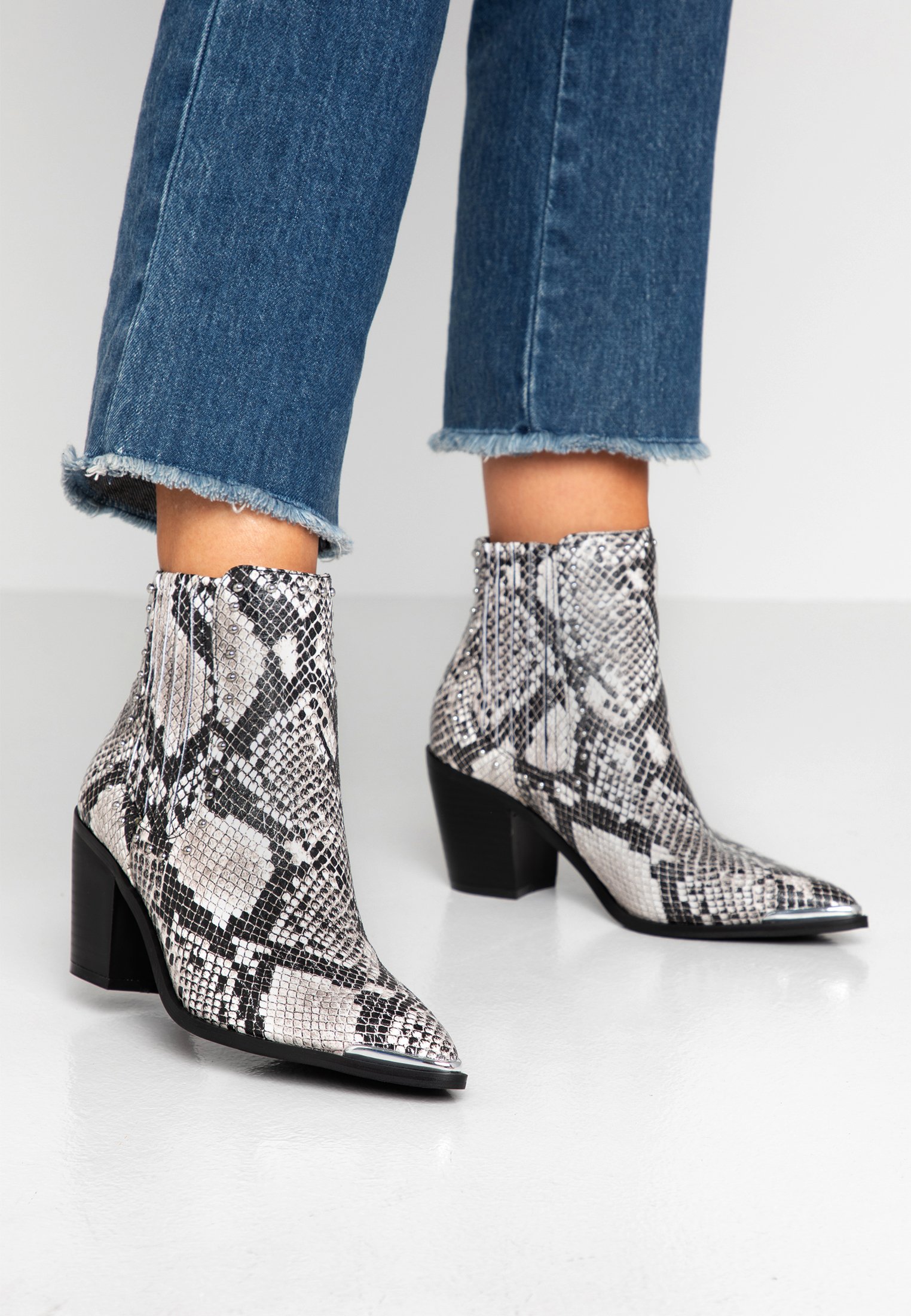 dune snakeskin heels