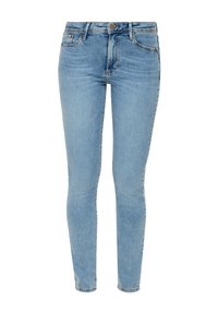 Lichtblauwe denim skinny jeans met een middelhoge taille, vijf zakken en subtiele vervaging. Voorzien van een messing knoop en ritssluiting.