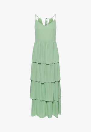 Ærmeløs maxi-kjole i lys grøn med lag på lag design, tynde stropper og bindebånd på nakken, med V-formet udskæring foran.