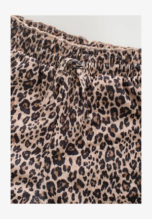 Shorts à motif léopard en tissu léger, dotés d'une taille élastique et d'un cordon de serrage, avec une surface texturée et des motifs de taches variés.