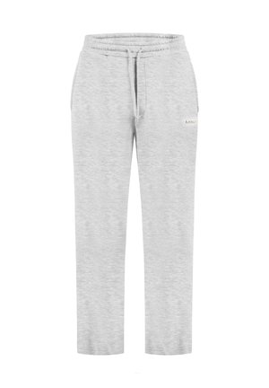 Lichtgrijze sweatpants gemaakt van zachte stof met een elastische tailleband, koord en zijzakken. Kenmerkt zich door een klein merklabel aan de zijkant.