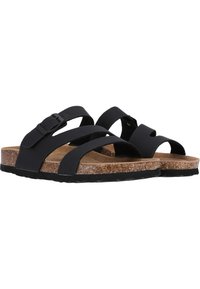 Sandales noires avec de larges brides et une boucle, semelle en liège et semelle en caoutchouc texturé pour une bonne adhérence.