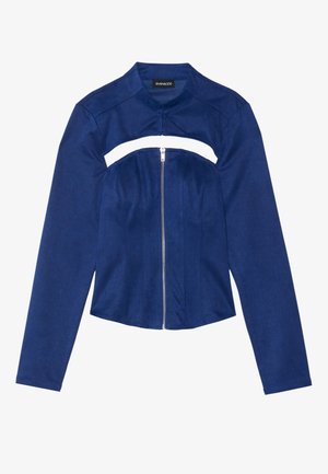 Navy blue jacket made from smooth fabric, featuring long sleeves, a cropped design, and a front zipper with a cutout detail at the chest.