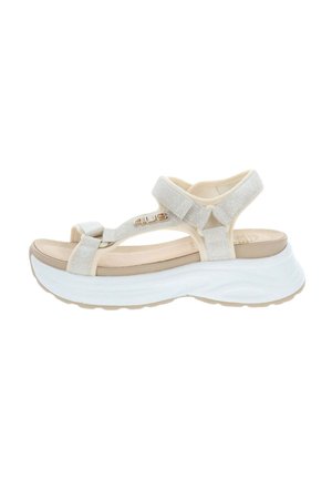Sandalia beige de punta abierta con tiras ajustables, suela acolchada y gruesa plataforma blanca para mayor altura y comodidad.