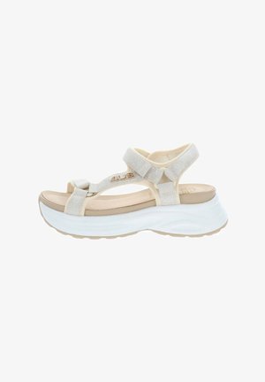Sandale beige à bout ouvert avec brides réglables, semelle rembourrée et épaisse semelle plateforme blanche pour plus de hauteur et de confort.