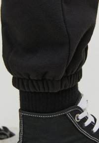 Jack & Jones JPSTKANE JOSH - Tracksuit bottoms - black