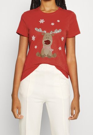 T-shirt di cotone rosso con un renna decorata con glitter, corna grigie e disegni di fiocchi di neve. Maniche corte e vestibilità comoda.