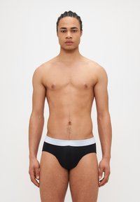 Calvin Klein Underwear - HIP BRIEF 3 PACK - Kratke gaće - black Minijatura 1