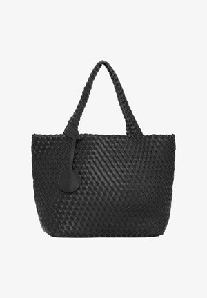 Black woven tote bag featuring long handles, a textured surface, and a round leather tag attached by a flat strap.