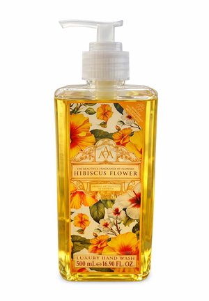 Klare rechteckige Flasche mit gelber Flüssig-Handseife und floralem Etikett mit der Aufschrift "Hibiscus Flower Luxury Hand Wash 500 ml."