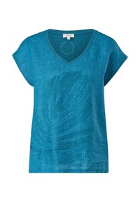 Blusa de lino azul de manga corta y cuello en V con un diseño de hojas grandes bordadas en tono sobre tono en la parte frontal.