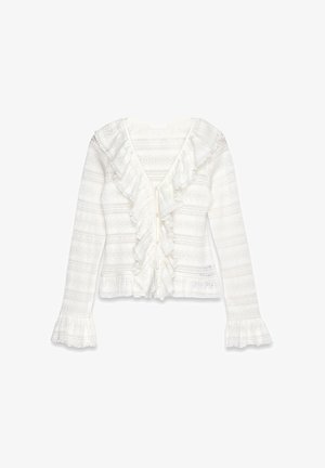 White ruffled cardigan with a deep V-neck, featuring textured stripes and flared sleeves. Buttons at the front add detail to the design.
