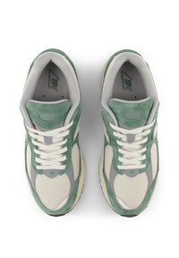 Green and grey mesh sneakers with suede accents, featuring a cushioned tongue, round laces, and a textured rubber sole.