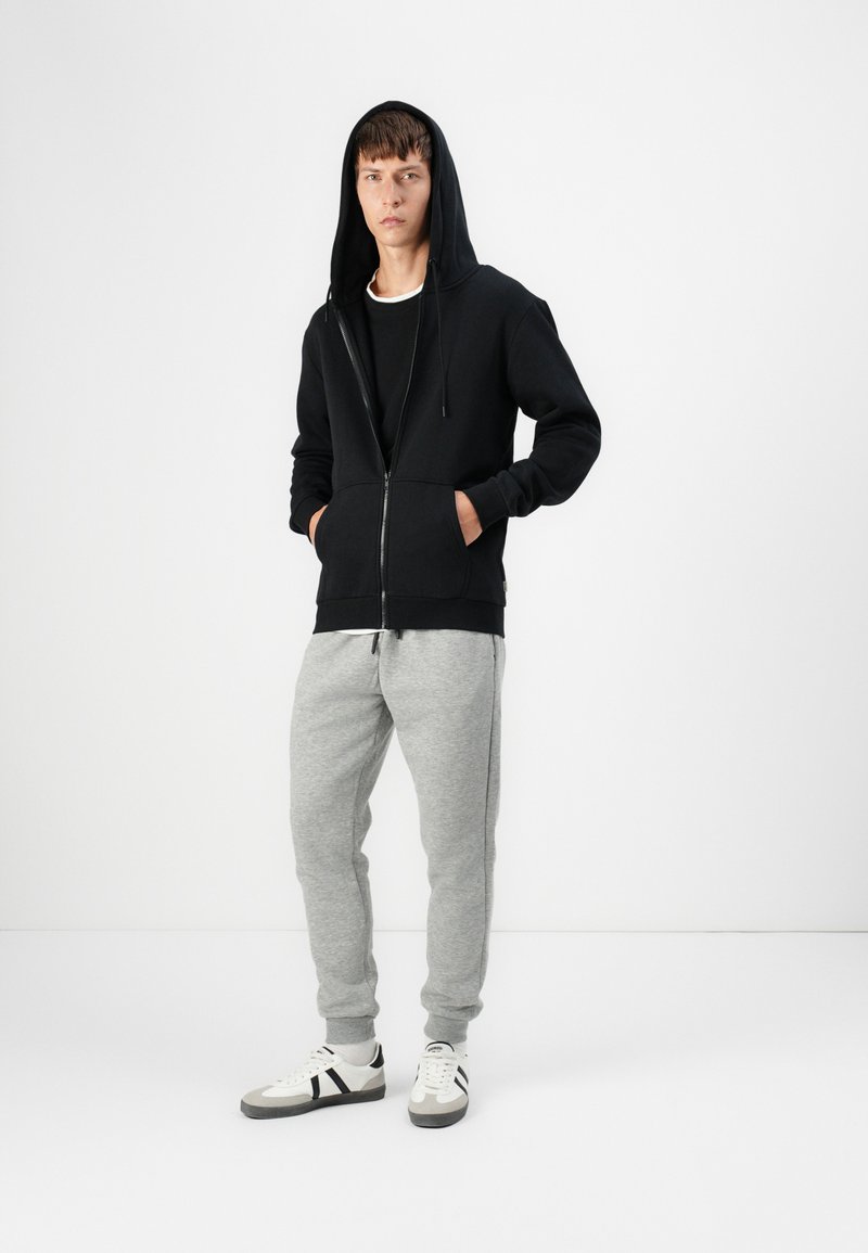Sweat à capuche zippé noir fille | La Halle