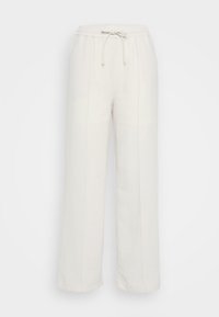 Pantalons en tissu tissé léger et blanc, avec une taille élastique et un cordon, présentant une coupe décontractée et des coutures latérales pour les détails.