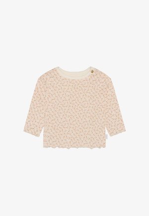 Babypetje met lange mouwen, crème basis en een all-over klein roze en bruin bloemenpatroon, geschulpte zoom en knoopje bij de halslijn.
