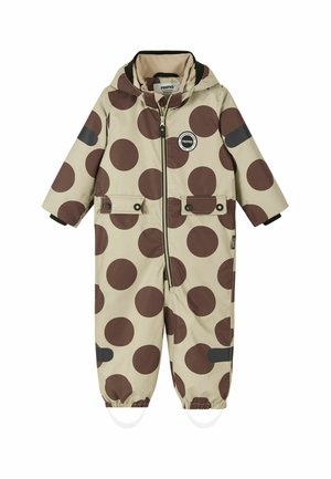 Beiger Kinderregenanzug mit großen braunen Punkten, Frontreißverschluss, zwei mit Knöpfen verschließbaren Taschen, elastischen Bündchen und reflektierenden Applikationen an Beinen und Ärmeln.
