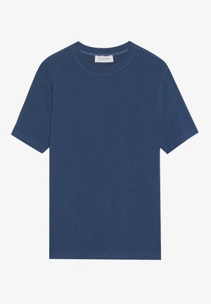 T-shirt bleu à côtes avec un col rond et des manches courtes. Le tissu a une apparence texturée et une coupe ajustée. L'étiquette indique "Pier One."