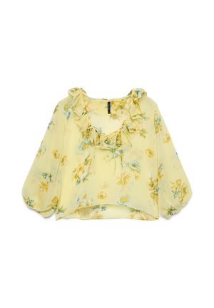 Blusa gialla trasparente con maniche lunghe a sbuffo, stampa floreale, scollo arricciato e dettaglio con fiocco sul petto.