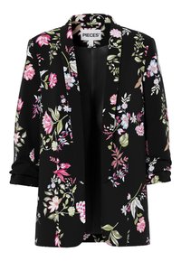 Blazer noir avec manches retroussées présentant un imprimé floral rose, blanc et vert, devant ouvert et étiquette "PIECES" au niveau du col.