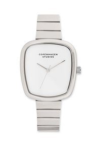 Orologio in acciaio inossidabile argentato con quadrante bianco a forma quadrata. Presenta indicatori delle ore minimalisti, lancette sottili e un cinturino metallico slanciato.