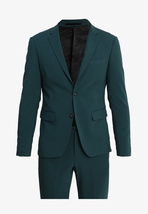 Teal two-piece suit featuring a single-breasted jacket with a notched lapel and matching trousers. Smooth fabric with a tailored fit.