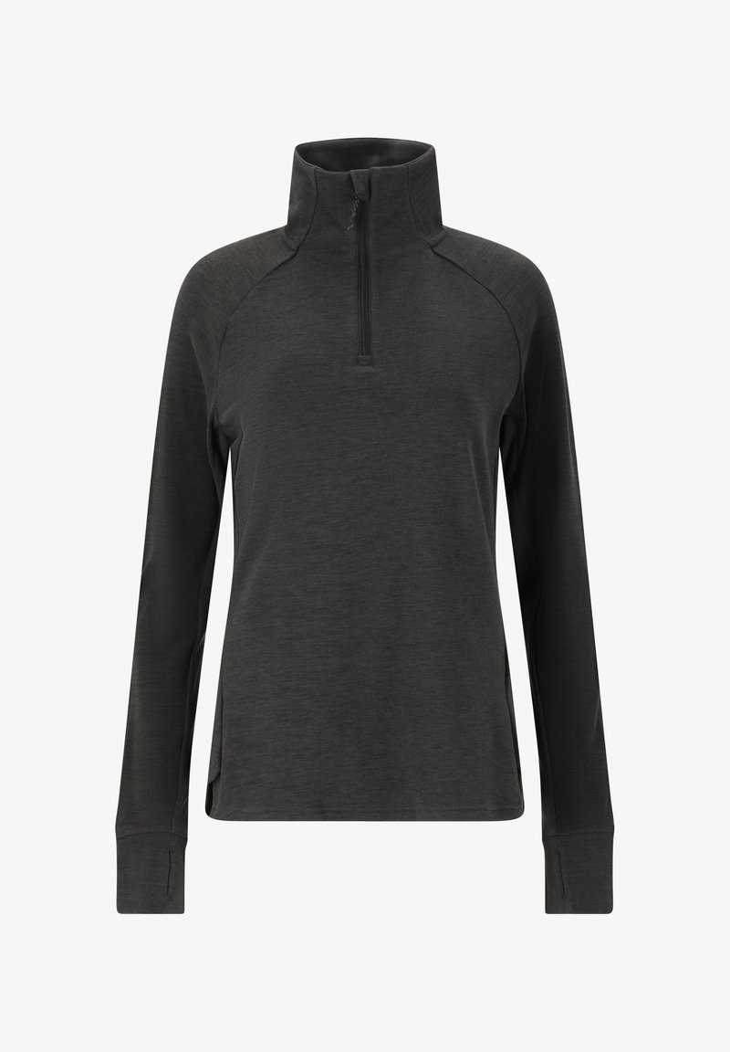 Sort langærmet top med kvart lynlås og raglanærmer, blød tekstur og sideslids for let bevægelse, designet til komfort og lag-på-lag.