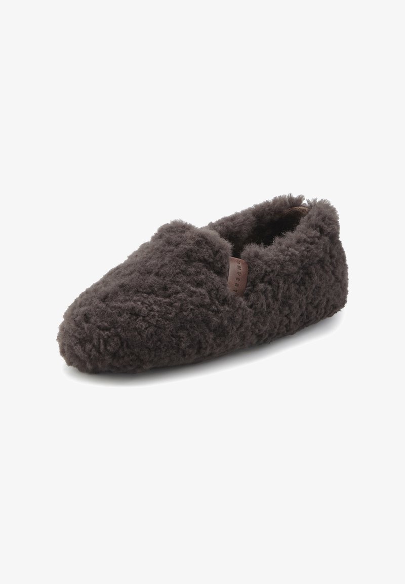 Dark brown, fluffy fur slip-on slipper with a rounded toe and a small leather accent on the side. Soft texture and cozy design.