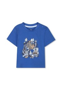 Blauwe T-shirt met korte mouwen van katoen, met een grafische print van een laars en gebouwen, en knopen op de schouder voor gemakkelijke aan- en uittrekken.