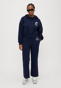 GAP Petite HERITAGE - Treniņtērpa apakšdaļas - navy