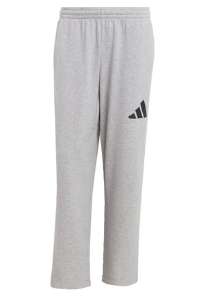 Gray sweatpants made of cotton blend. Features an elastic waistband and a black adidas logo design on the left thigh. Straight leg cut.
