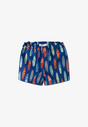 Shorts de plage bleus avec un motif de planches de surf colorées et de lunettes de soleil. Dotés d'une taille élastique et d'un cordon de serrage pour un ajustement.