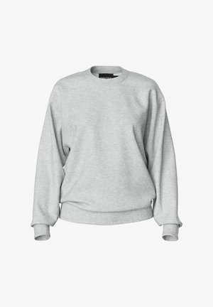 Gaiši pelēks krekls ar apaļu kakla izgriezumu, garām piedurknēm, ribotām aprocēm un brīvu piegriezumu. Izgatavots no mīkstas auduma ar minimālu apdari.