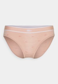 Pink cotton brief with white elastic waistband. Notable Lacoste logo and repeating small logos in a lighter shade. Smooth texture.