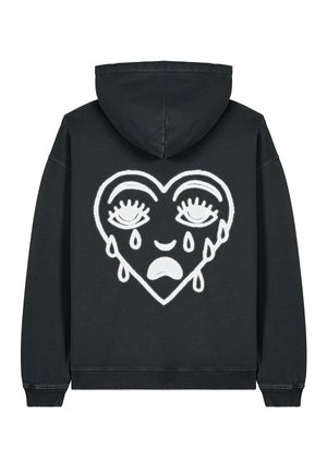 Black hoodie featuring a large white embroidered heart design with eyes and tears, made from soft cotton fabric with a relaxed fit.