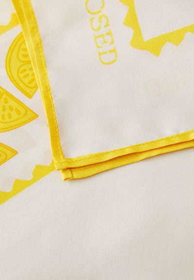 Lemon-patterned fabric with a cream background, featuring a yellow satin edge and intricate yellow graphic details.