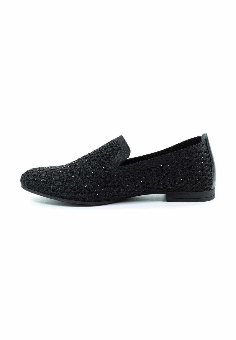 Scarpe nere slip-on con upper in mesh testurizzato e un leggero luccichio, tacco basso e suola in gomma nera liscia.