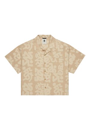 Chemise à manches courtes en tissu beige présentant de grands motifs abstraits blancs, un col pointu et une poche poitrine avec des boutons marron.