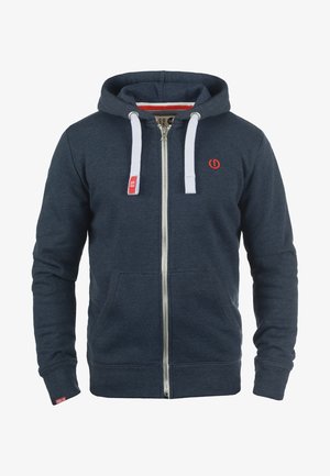 Navy zip-up hoodie made of soft fabric, featuring a front zipper, two side pockets, white drawstrings, and a small red logo on the chest.