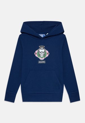Sudadera azul marino con un bolsillo delantero, que presenta un gráfico colorido de un tigre y una calavera rodeados de hojas. Fabricada en suave material de algodón.