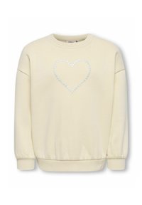 Felpa color crema con scollo rotondo e maniche arricciate, con un design a forma di cuore realizzato con piccoli dettagli scintillanti sul davanti.