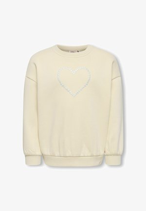 Sweat-shirt couleur crème avec un col rond et des manches froncées, arborant un motif de cœur composé de petits accents brillants sur le devant.