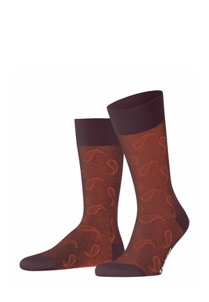 Bordeauxfarbene Socken mit Paisley-Muster in hellerem Rot. Gerippte Bündchen, verstärkte Ferse und Zehen für Haltbarkeit. Hergestellt aus einem glatten, elastischen Material.