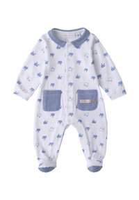 Romper intero bianco, con stampa di balene blu. Presenta un colletto blu a righe e tasche, con chiusure a scatto lungo la parte anteriore. Materiale in cotone.