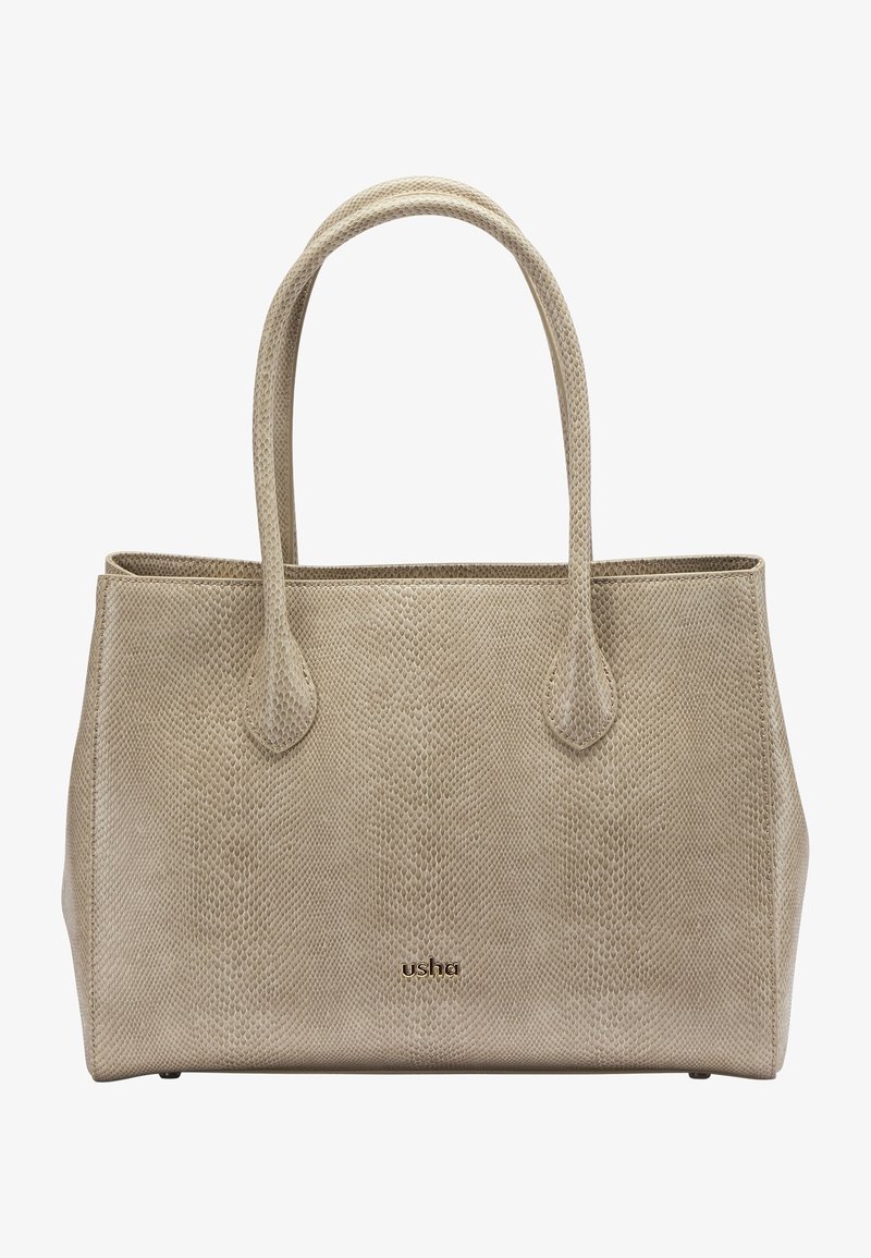 Sac fourre-tout beige texturé avec de longues poignées et petit logo doré "usha" au centre devant, forme rectangulaire aux côtés souples.