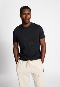 Hummel ICONS GRAPHIC - T-shirts print - black